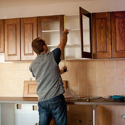 Kitchen Contractor Measuring Cabinet Doors